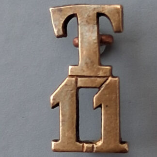 T.11 - Gilding Metal Shoulder Title.