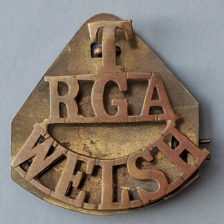 Welsh Royal Garrison Artillery - Gilding Metal Shoulder Title.