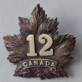 (Canada) WW1 12th Battalion C.E.F - Bi Metal Cap Badge.
